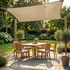 voile d'ombrage kaki rectangulaire ombrela au dessus d'une terrasse de jardin de maison