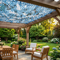 filet de camouflage camouflage bleu mer de la marque ombrela sur une pergola de jardin moderne